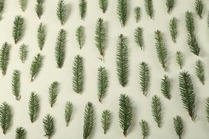 New Year's Eve background with fir branch and cones. Christmas and New Year holidays composition of pine tree branches. photo