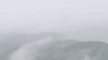 Time Lapse of Mist Flowing Through Mountains in Winter video