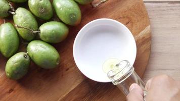 Olive oil poured into bowl video