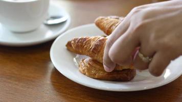 Plate of croissants at a cafe table video