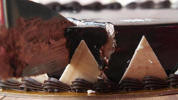 A chocolate tart being sliced video