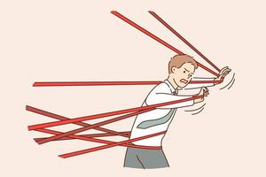 Business difficulty, problem, struggling concept. Angry businessman tied up with red tape trying to run away with full effort and feeing anger rage trying to overcome to reach success vector