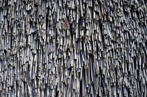 The thatched roof texture of an old house photo