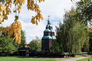 Ancient wooden church  in Ukraine Cross photo