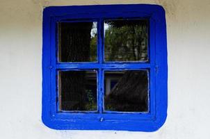 Window with wooden shutters photo