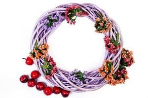 Wreath woven from the branches of the vine isolated , Place for text photo