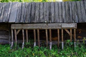 harness for horses , wooden fence photo