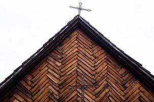 Ancient wooden church  in Ukraine Cross photo