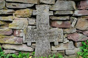 Ancient wooden church  in Ukraine Cross photo