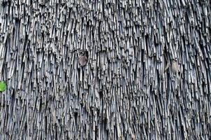 The thatched roof texture of an old house photo