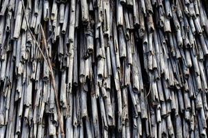 The thatched roof texture of an old house photo