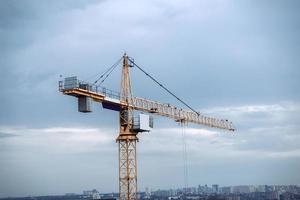 Cranes at construction site. building crane on sky photo