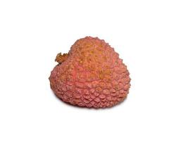 Lychee on the table. Chinese plum on a white background. Ripe fruit from Asia. Delicious product. photo