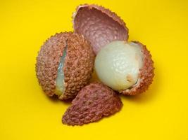 sliced lychee. Round pimply fruits. Chinese plum. fruit peel. photo