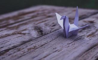 The origami bird is believed to be a sacred bird and a symbol of longevity, hope, good luck and peace photo