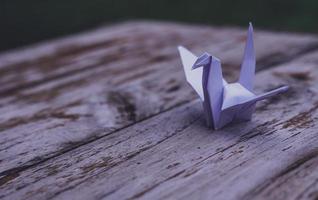 The origami bird is believed to be a sacred bird and a symbol of longevity, hope, good luck and peace photo