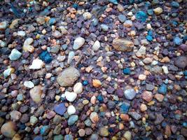 pebble texture multicolored vignette background design photo