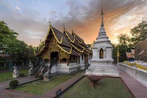 Phra Singh temple twilight time Viharn Lai Kam Wat Phra Singh is located in the western part of the old city center of Chiang Mai. photo