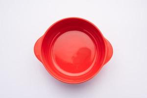 Empty Red ceramic bowl or container photo