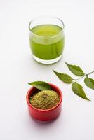 Neem Powder, paste and juice. Azadirachta indica or commonly known as nimtree or Indian lilac photo