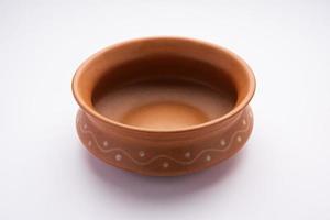Empty Terracotta bowl or earthen serving crockery photo