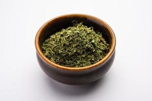 Kasuri Methi or Kasoori Methi or dried fenugreek leaves also known as Trigonella Foenum Graecum photo