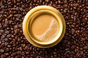 South Indian Filter coffee served in a traditional brass or stainless steel cup photo