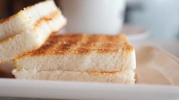 Close up of white bread sandwich with no crust