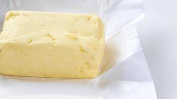 Close up pan of block of butter video