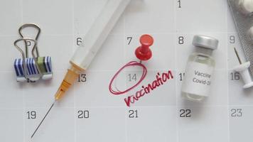 A paper calendar marking the vaccination day video