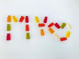 gelatinous, multi-colored, voluminous bears in the form of the word MY. appetizing, sweet, edible inscription made of sweets, next to it is a heart of marmalade. favorite gummy treats photo