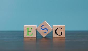 ESG - short for environmental social governance. Environment is company's responsibility. Social is employees, suppliers, customers. Governance is effective, transparent, auditable management. photo