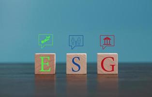 ESG - short for environmental social governance. Environment is company's responsibility. Social is employees, suppliers, customers. Governance is effective, transparent, auditable management. photo