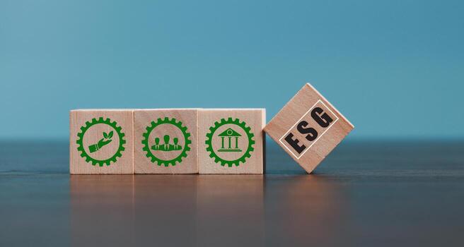 ESG - short for environmental social governance. Environment is company's responsibility. Social is employees, suppliers, customers. Governance is effective, transparent, auditable management. photo