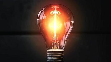 A light bulb that flashes because of an energy crisis. electric power shortage concept video