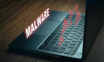 VR warning malware screen on laptop. Cyber security data protection business technology. photo