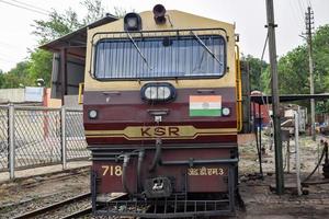 Kalka, Haryana, India May 14 2022 - Indian toy train diesel locomotive engine at Kalka railway station during the day time, Kalka Shimla toy train diesel locomotive engine photo