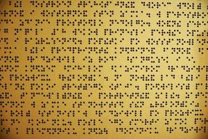 Braille plate. Inscription for blind people