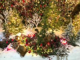 Christmas background, garland lights toys snowflakes snow glare night photo