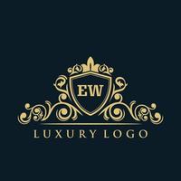 Letter EW logo with Luxury Gold Shield. Elegance logo vector template.