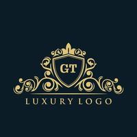 Letter GT logo with Luxury Gold Shield. Elegance logo vector template.