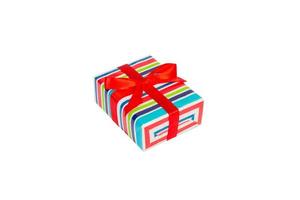 Christmas or other holiday handmade present in colored paper with red ribbon. Isolated on white background, top view. thanksgiving Gift box concept photo