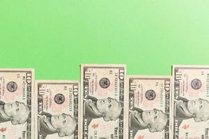 one hundred dollar bills Top view of business concept on background with copy space photo