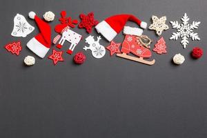 New Year decorations on black background. Merry Christmas concept with empty space for your design photo