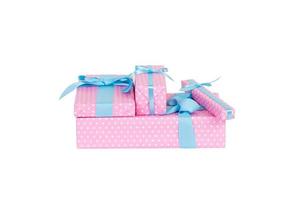 Group of Christmas or other holiday handmade present in pink paper with blue ribbon. Isolated on white background, top view. thanksgiving Gift box concept photo