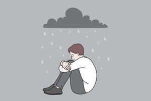 Depression and feeling lonely concept. Young depressed sad frustrated teen sitting under heavy rain on ground vector illustration