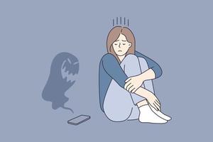 Cyberbullying and abuse in internet concept. Young sad depressed girl cartoon character sitting looking on smartphone with monster flying over it vector illustration