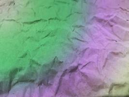 Background of pastel pieces of crumpled paper. photo