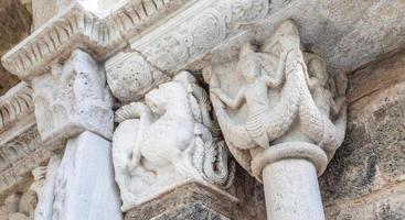 St Michael Abbey - Sacra di San Michele - Italy. Gargoyle monster sculpture, 11th Century. photo