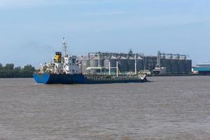 Large vessels transport gas or oil by sea.Ship industry freight fuel global. photo